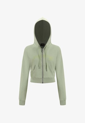 Crop hoodie med lynlås i lys grøn med en kontrasterende mørkegrøn foret hætte. Har frontlommer og snore detaljer. Blødt stof.