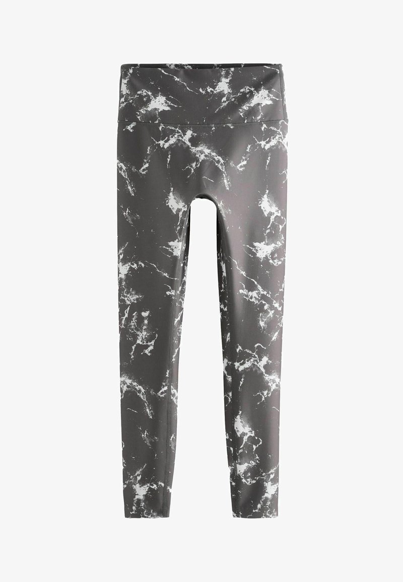 Grå leggings med ett marmorlikt vitt mönster, hög midja, slät textur och figurnära design. Sömdetaljer synliga längs sidorna.