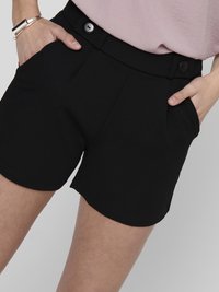 Black shorts made of a smooth fabric with a tailored design, featuring two side pockets and two front buttons.