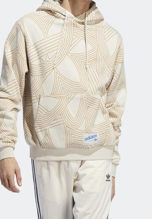Beige Kapuzenpullover mit einem geometrischen Wellenmuster in Hellbraun, mit einer Vorderasche und einem Adidas-Logopatch am Saum.