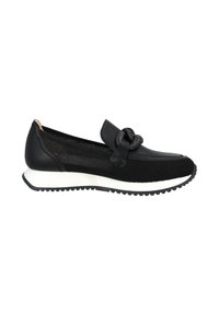 Zapatos negros de malla sin cordones con un acento anudado, que cuentan con una suela blanca acolchada y una textura de goma en la suela para mayor agarre.