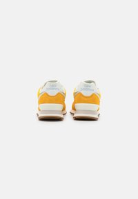 New Balance U574SOC UNISEX - Sportcipő - aztec gold