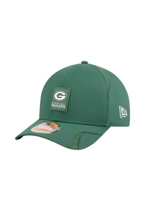 Green baseball cap with a structured crown, featuring a square logo patch and stitching accents. Made from a smooth, durable fabric.