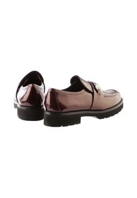 Burgundy leather shoes with a glossy finish, featuring a rounded toe, subtle stitching, and a chunky black sole. Metal buckle detail on top.