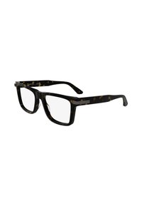 Lunettes en écaille de tortue avec une épaisse monture en plastique noir, des verres rectangulaires et un accent métallique sur les branches.