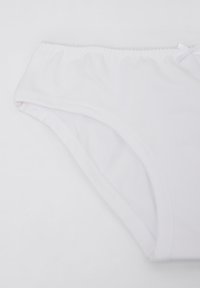 Parte inferiore di bikini bianco realizzata in tessuto morbido, con una vita arricciata e un piccolo dettaglio con nastro nella parte anteriore.