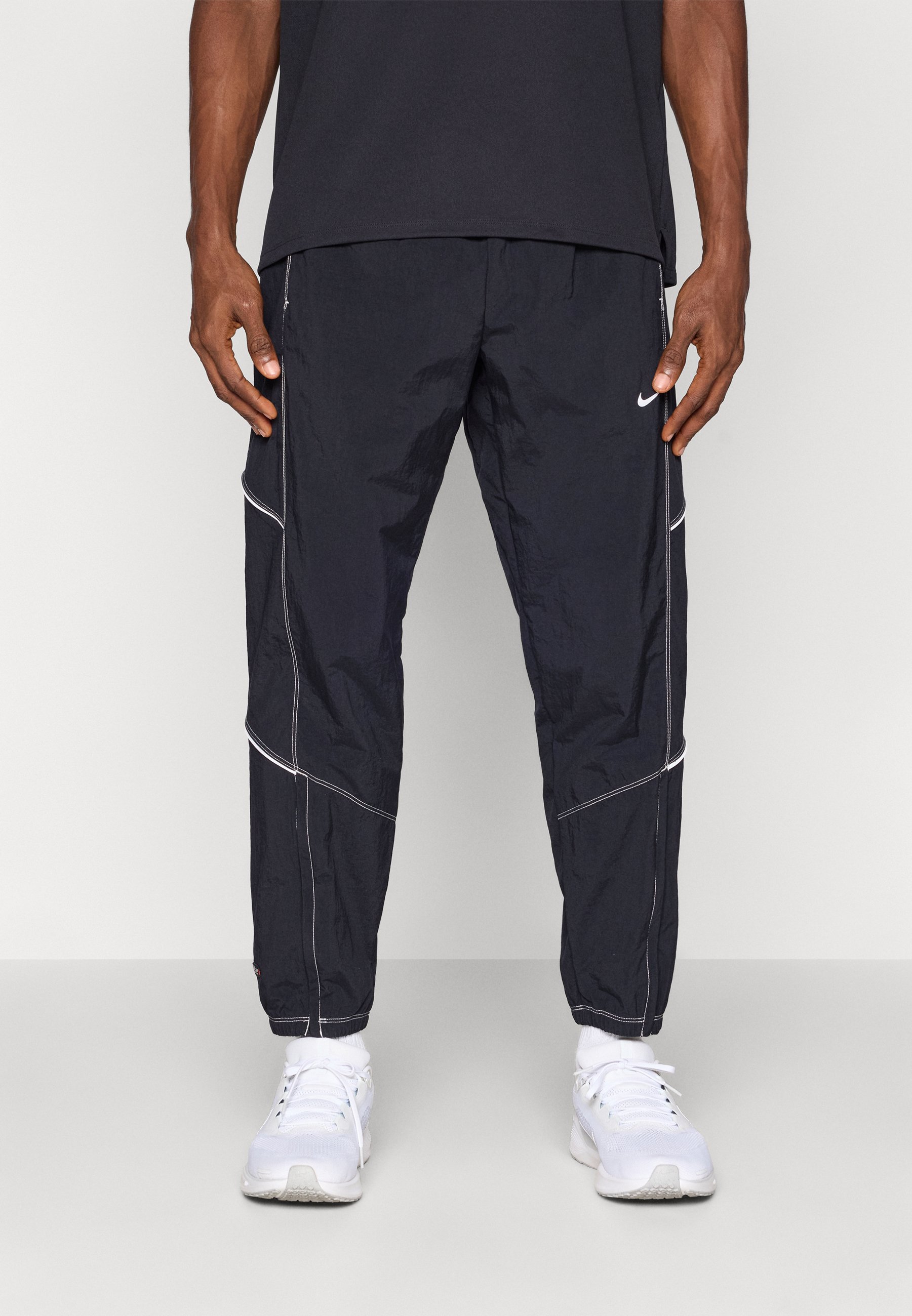 nike sb swoosh black track pants