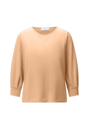 Beige long-sleeve blouse with round neckline and slightly gathered cuffs, plain design, displayed on white background.