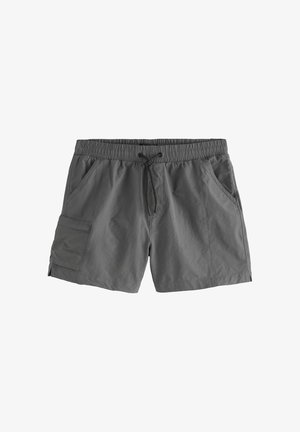 Harmaat uimashortsit, joissa on joustava vyötärönauha ja kiristysnyöri. Varustettu kahdella sivutaskulla ja yhdellä reisitaskulla vasemmalla reidellä. Kevyt kangas.