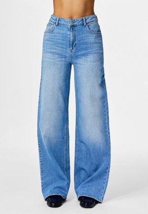 PCSILKE WIDE - Wide leg - light blue denim