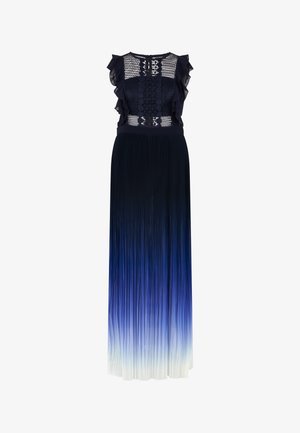 Mouwloze maxijurk met marineblauw gehaakt lijfje, geplooide schouderdetails en een geplooide rok die vervaagt van donkerblauw naar wit.