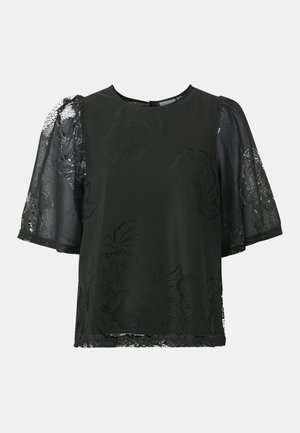 Svart topp med gjennomsiktige blonde kortermede ermer og blomsterdesign. Kroppen har en matt overflate, mens ermene tilfører tekstur og kontrast.