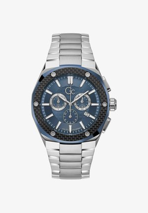 Orologio cronografo con quadrante in fibra di carbonio blu, cassa e bracciale in acciaio inossidabile con finitura argento. Presenta sub-quadranti, display della data e lancette luminescenti.