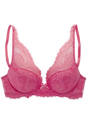 Soutien-gorge en dentelle rose pâle avec décolleté plongeant, bonnets rembourrés, motif floral et bretelles en satin. Comprend un petit nœud et un accent en bijou au centre.