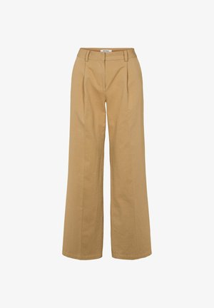 Pantalones de pierna ancha en beis, hechos de una tela ligera, con una cintura alta, frente plisado y líneas limpias para una silueta estilizada.