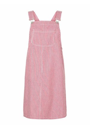 Robe salopette sans manches à rayures verticales rouges et blanches avec poche avant et bretelles ajustables avec boucles métalliques.