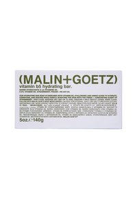 Weißer rechteckiger Karton mit der Aufschrift "(MALIN+GOETZ)" in grün, der Produktdetails und Inhaltsstoffe enthält. Größe: 5 oz (140 g).
