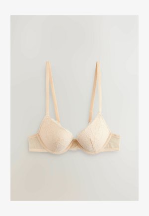 Beige spetsbehå med formade kupor, justerbara axelband och dekorativ scalloped fåll. Slät ryggband med mjuka meshsidor.