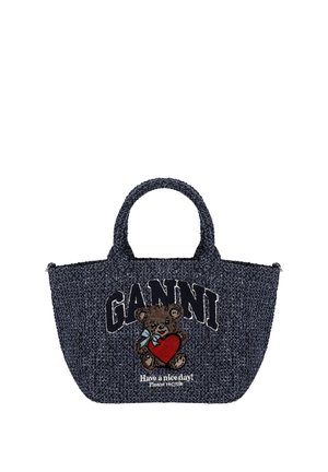 Borsa tote blu scuro testurizzata con un orsetto che tiene un cuore rosso, testo "GANNI" sopra e "Buona giornata! Per favore ricicla" sotto.
