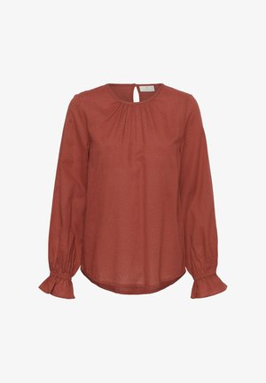 rostfarbene Bluse mit langen Puffärmeln, runder Halslinie und einem Schlüssellochverschluss im Rücken. Texturiert mit Raffung am Neckholder und an den Manschetten.