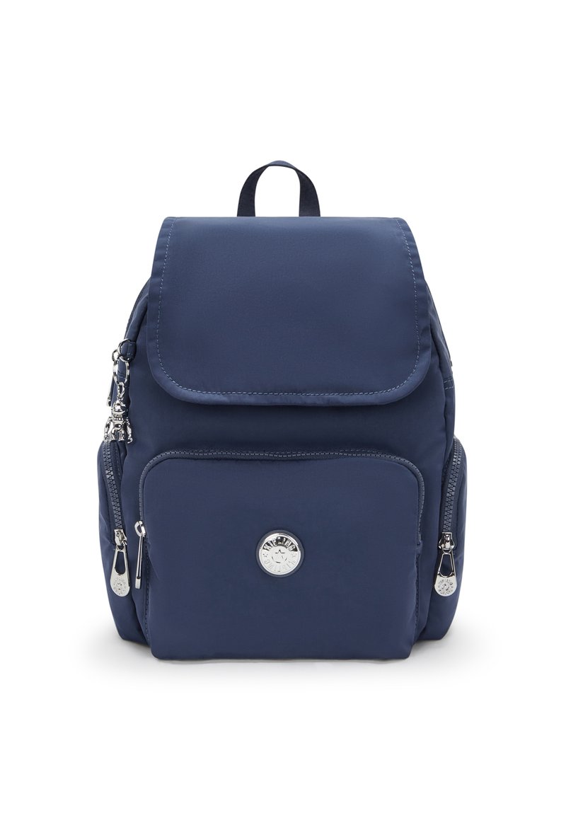 Navy blue backpack made of soft fabric, featuring a flap closure, front zipper pocket, and silver hardware accents. Compact and structured design.