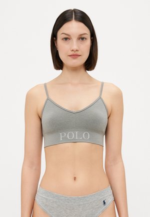 Pelēks ribots bralets ar regulējamiem siksnām un izšūtu "POLO" uz joslas. Audums ir mīksts, piemērots ikdienas valkāšanai.