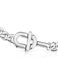 Pulsera de cadena de plata con un cierre de toggle seguro, superficie lisa y eslabones redondeados, que refleja la luz gracias a su acabado pulido.