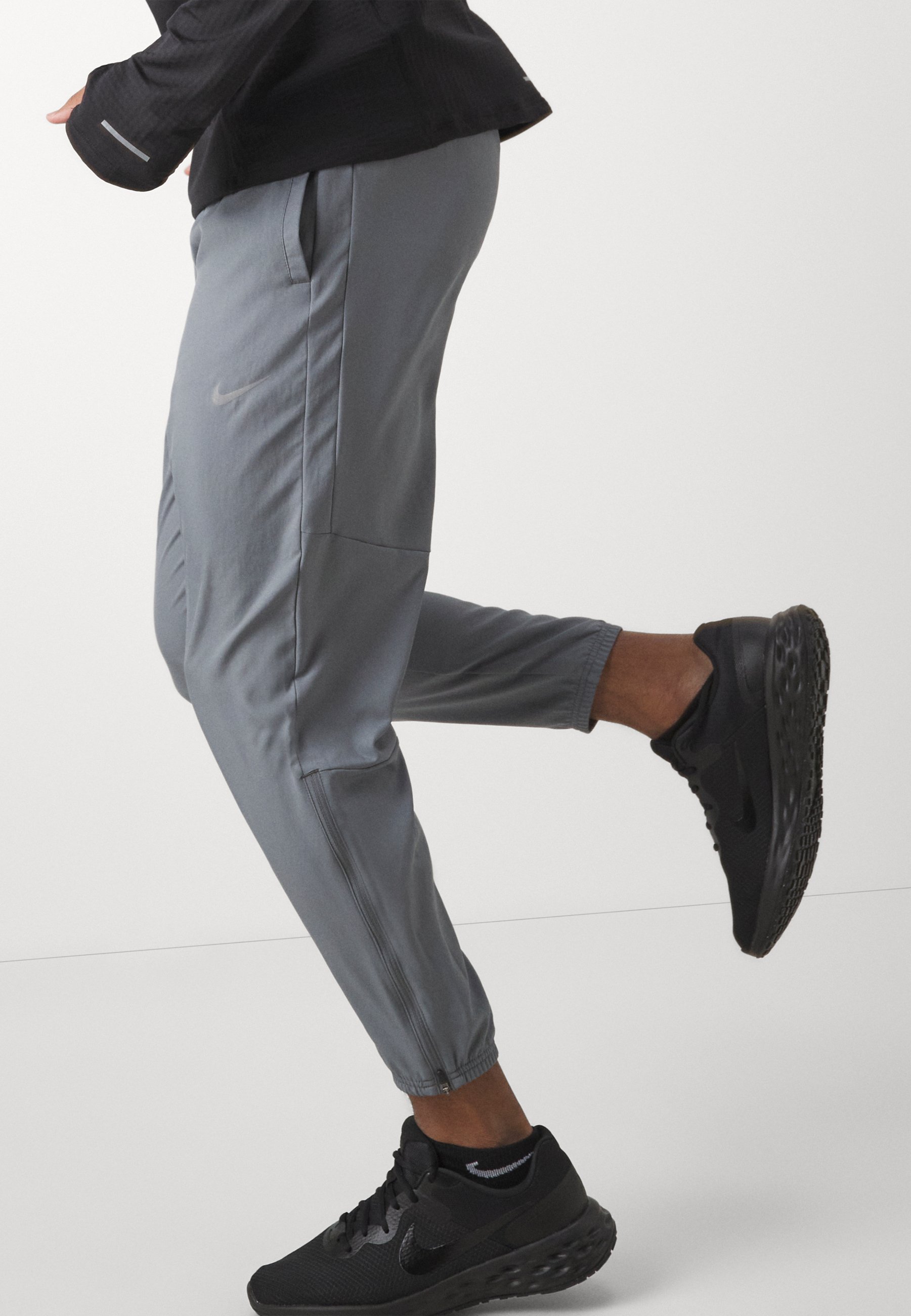 nike flex track pants