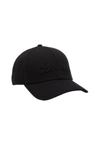 Casquette de baseball noire en tissu avec un design sans coutures, arborant un logo brodé "Calvin Klein" sur le devant.