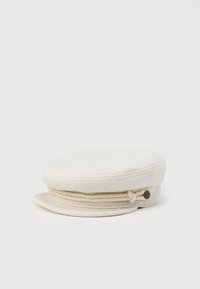 White fabric captain-style cap with a short brim and decorative braided rope and button detail on the front.