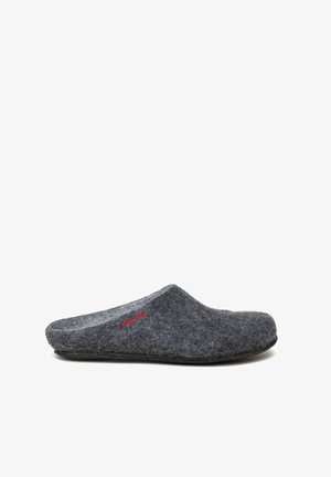 Gray felt slipper featuring a soft texture, closed back design, and a red logo detail on the side. Flat rubber sole for improved traction.