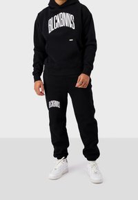 Black Bananas JOGGING ARCH - Träningsbyxor - black
