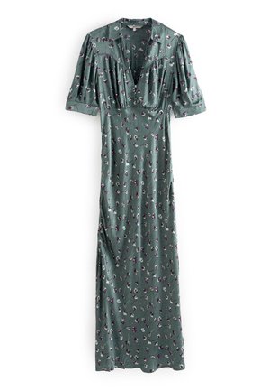 Robe longue verte à fleurs avec manches courtes bouffantes, encolure en V, détails plissés sur la poitrine et motifs délicats de fleurs violettes et blanches.