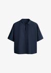 POLO SHIRT - Blouse - metallic blue