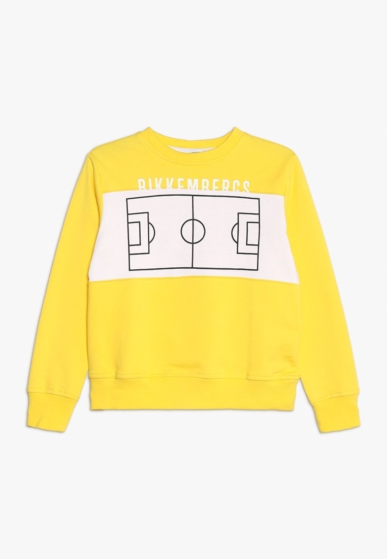 Sweat-shirt jaune avec un panneau horizontal blanc présentant un terrain de football aux contours noirs et le texte "BIKKEMBERGS" au-dessus.