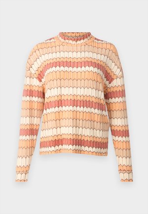 Struktuurne sviiter kõrge kaelusega, millel on geomeetriline muster pesamotiivides, kreemi ja roostes toonides. Pikad varrukad ribidega lõppudega.