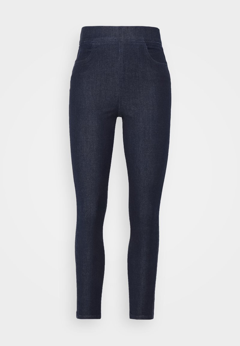 Jean skinny taille haute bleu foncé avec poches avant et coutures visibles, présenté sur un fond blanc uni.