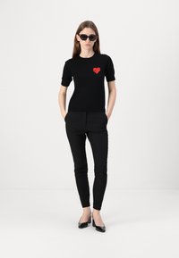 HUGO HAGONIA - Chino stiliaus kelnės - black