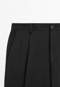 Black tailored trousers with belt loops, side pockets, front pleats, and a button closure on the waistband.