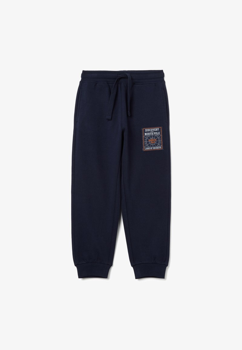 Pantalons de jogging bleu marine avec des poignets et une taille élastiques, cordon de serrage, poches latérales et un patch de découverte du Pôle Nord sur la cuisse droite.