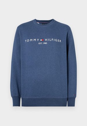 Blauwe sweatshirt gemaakt van een katoenmix. Crew neck ontwerp met witte "TOMMY HILFIGER EST. 1985" logo. Geribbelde manchetten en zoom.