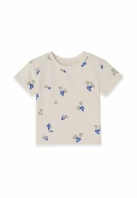 Kortærmet t-shirt i lys beige med ribbet tekstur, prydet med spredte blå druer og grønne blade. Rund halsudskæring, afslappet pasform.
