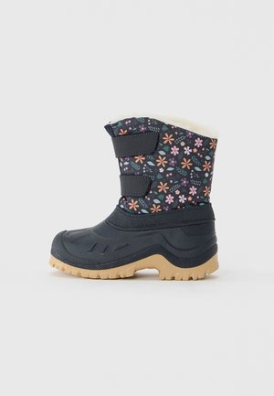 Botte d'hiver pour enfant jusqu'à mi-mollet avec dessus en tissu à motif floral, partie inférieure en caoutchouc noir, semelle beige à rainures et deux bandes velcro réglables.
