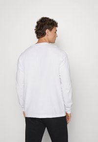Champion LONG SLEEVE - Topper langermet - white