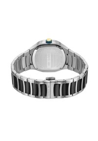 Orologio in acciaio inossidabile con cinturino nero e argento, caratterizzato da maglie rettangolari e un fondo cassa testurizzato con una corona blu.