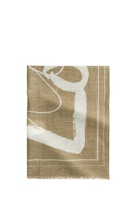 Echarpe beige avec un design abstrait blanc, de forme rectangulaire, bords frangés et texture légère. Présente un motif subtil dans le tissu.