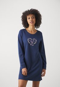 Navy long-sleeve dress features a round neck and a floral heart graphic with text. Made of soft fabric, it has a relaxed fit.