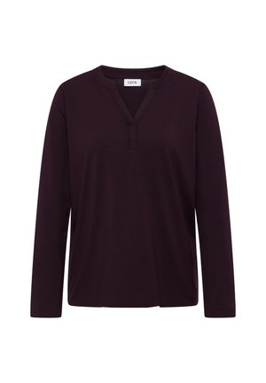 Långärmad topp i mörk lila, med V-hals och en liten spricka, tillverkad av mjukt tyg, med en avslappnad passform och inga synliga mönster.