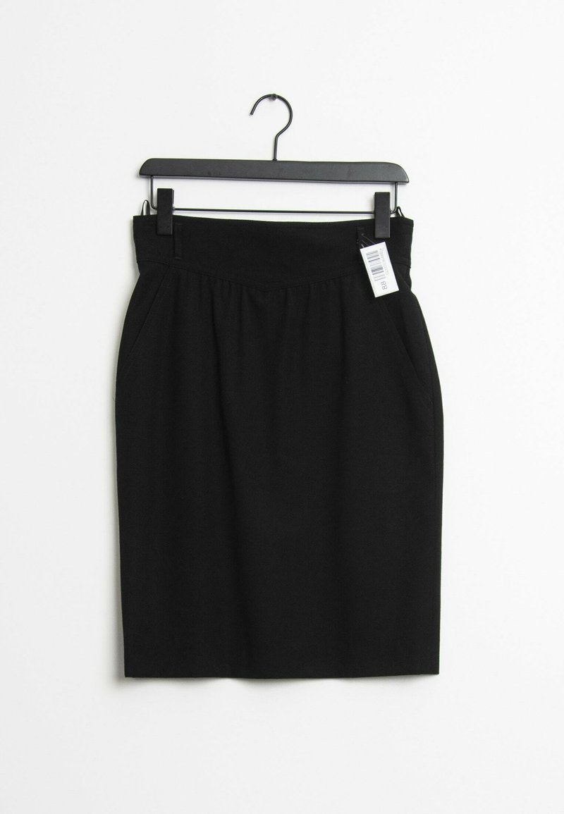 Black pencil skirt made of a smooth fabric, featuring a high waistband, slight pleats, and a clothing tag attached. Hangs from a black hook.