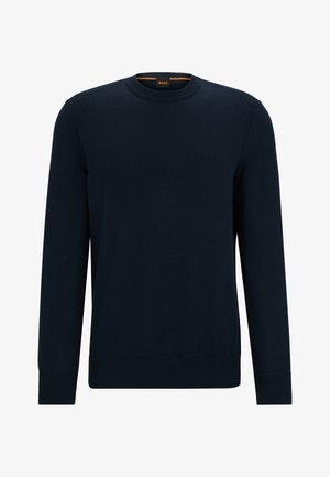 Mørkeblå crew-neck sweater lavet af glat stof, med ribbede manchetter og kant, samt et subtilt præget logo på brystet.
